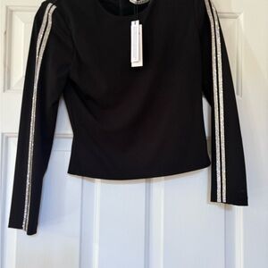 NWT ALICE+ OLIVIA SIZE 2. Black Long Sleeve Top  Crystal Accents & back zipper.